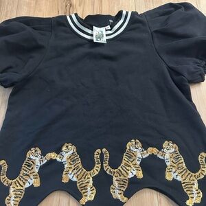 QUEEN OF SPARKLES Black Top with Gold Tiger Embellishments